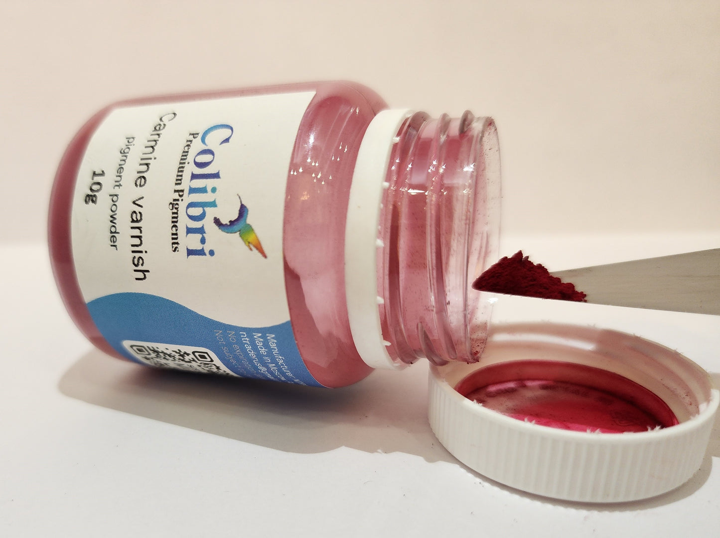 Carmine varnish