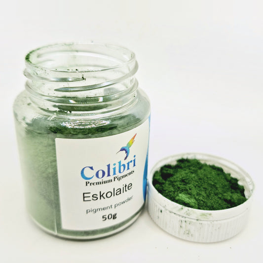 Eskolaite pigment powder, open jar