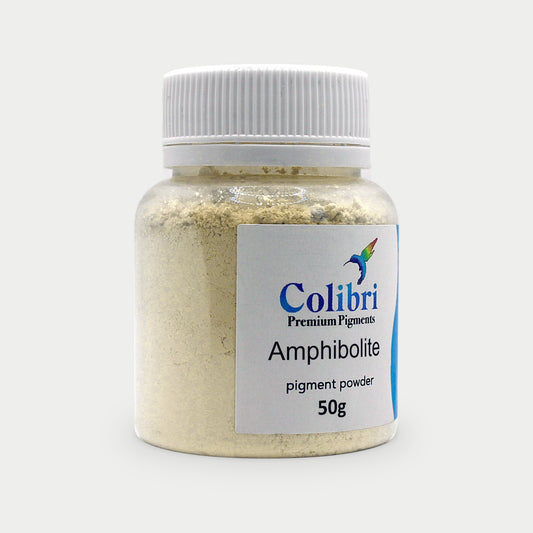Amphibolite pigment powder in a Colibri jar