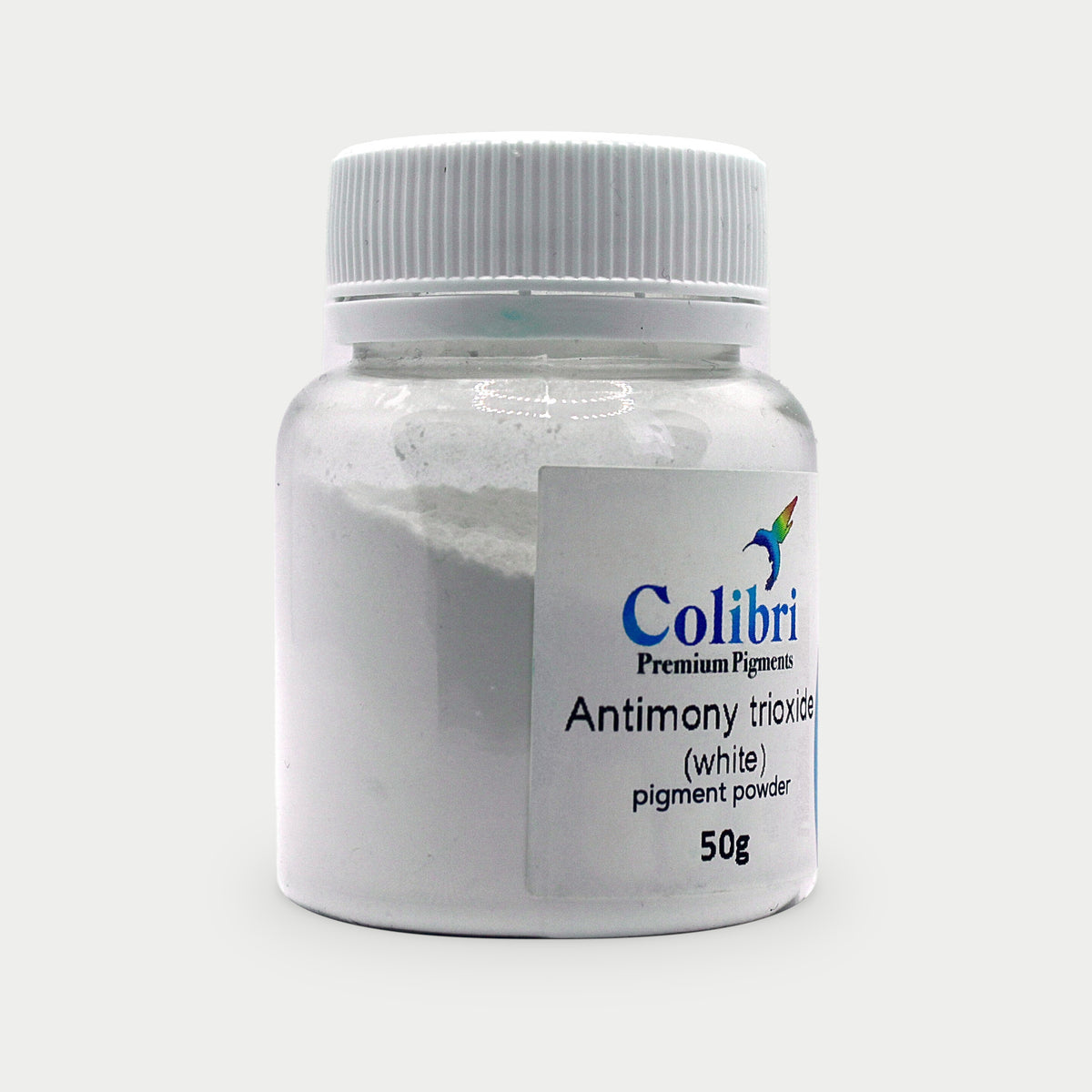 Antimony trioxide pigment powder in a Colibri jar