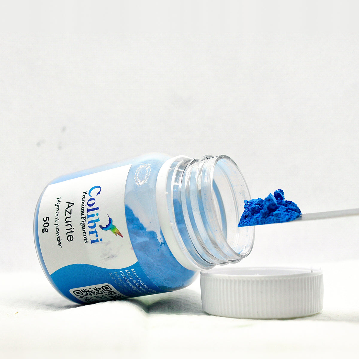 Azurite pigment powder, open jar