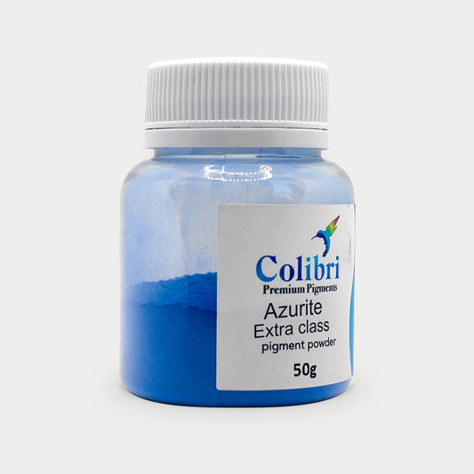 Azurite Extra class pigment powder in a Colibri jar