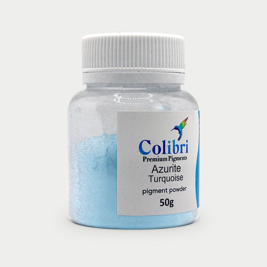 Azurite turquoise pigment powder in a Colibri jar