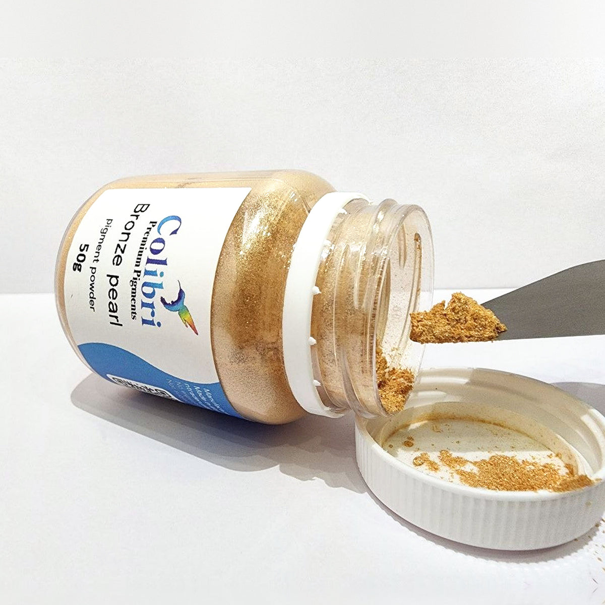 Bronze pearl pigment powder, open jar