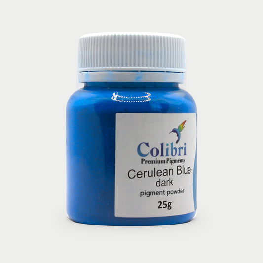 Cerulean blue dark pigment powder in a Colibri jar