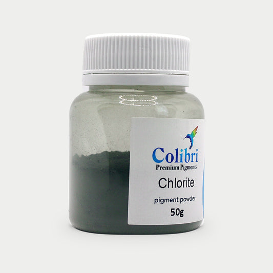 Chlorite pigment powder in a Colibri jar
