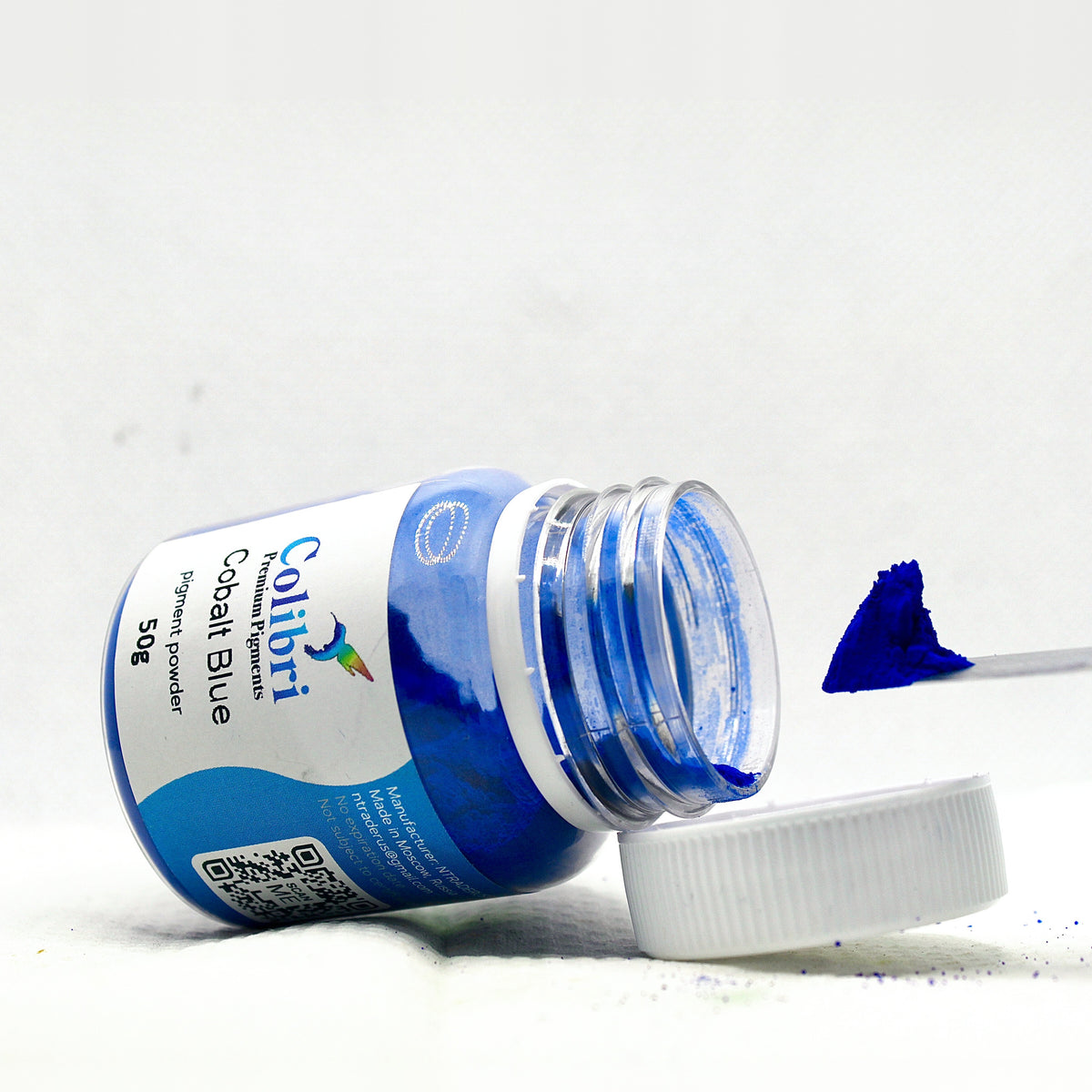 Cobalt blue pigment powder, open jar