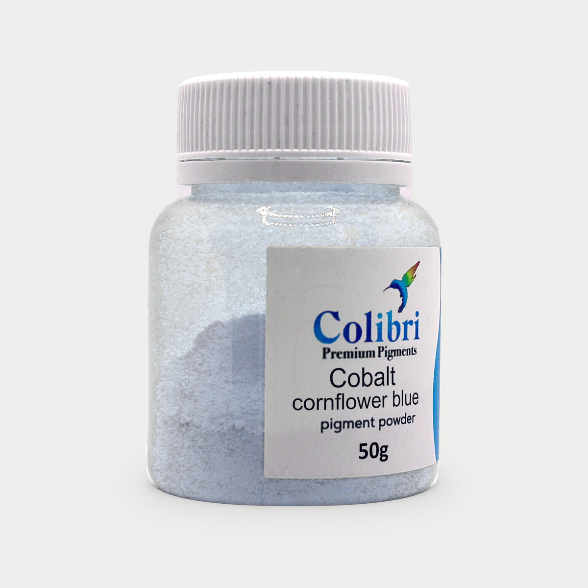 Cobalt cornflower blue pigment powder in a Colibri jar