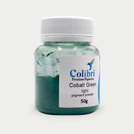 Cobalt green light pigment powder in a Colibri jar