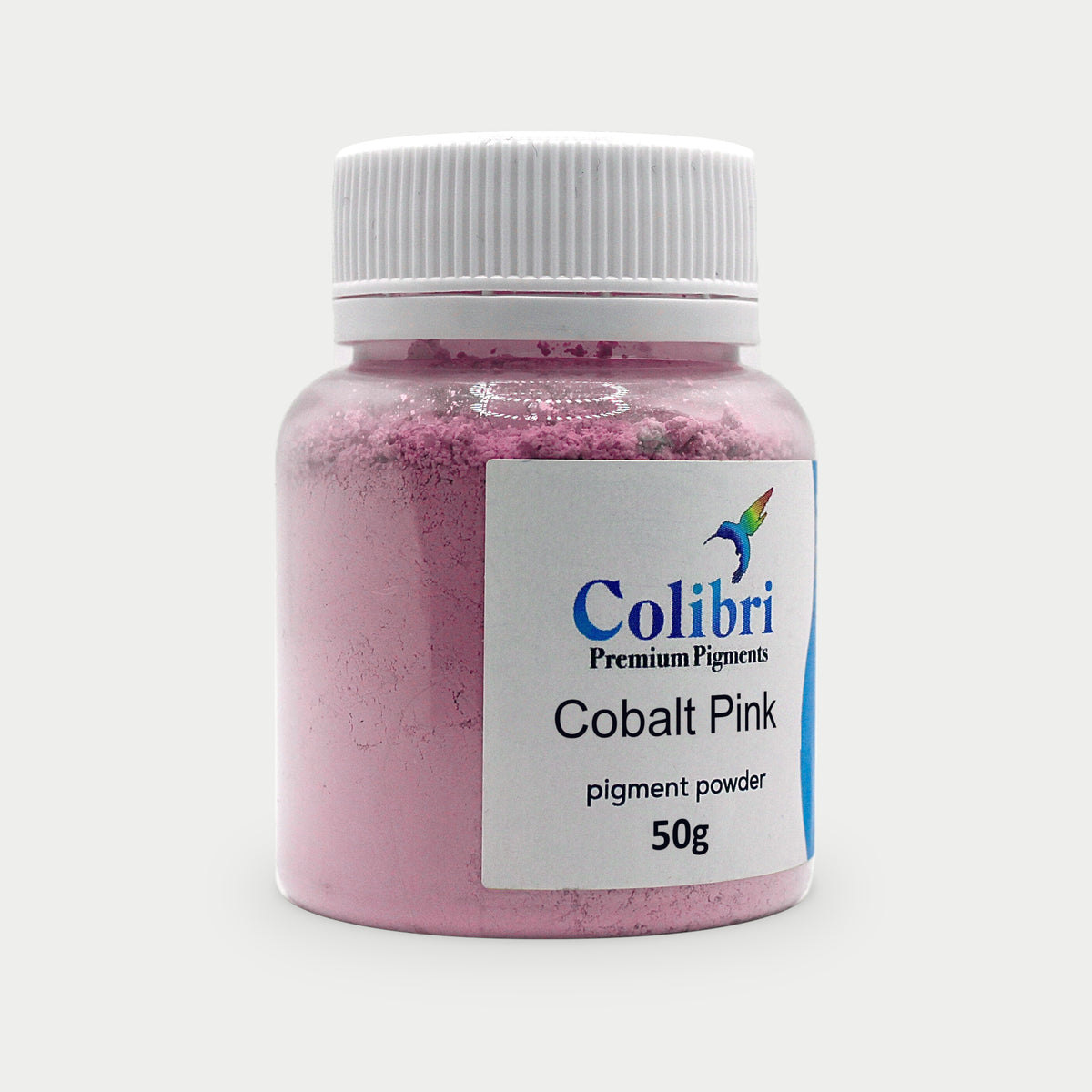 Cobalt Pink pigment powder in a Colibri jar