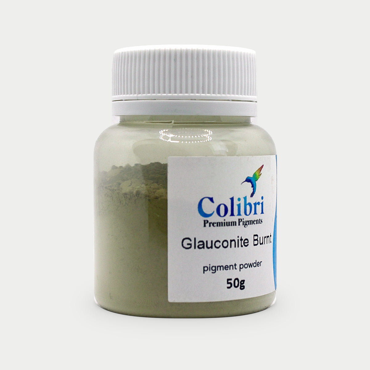 Glauconite burnt pigment powder in a Colibri jar