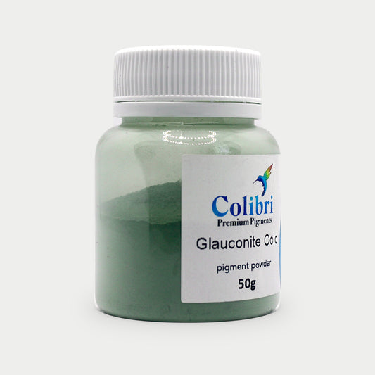 Glauconite cold pigment powder in a Colibri jar