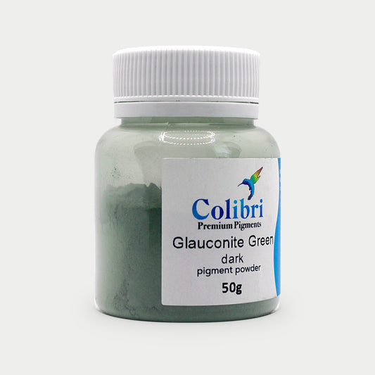 Glauconite green dark pigment powder in a Colibri jar