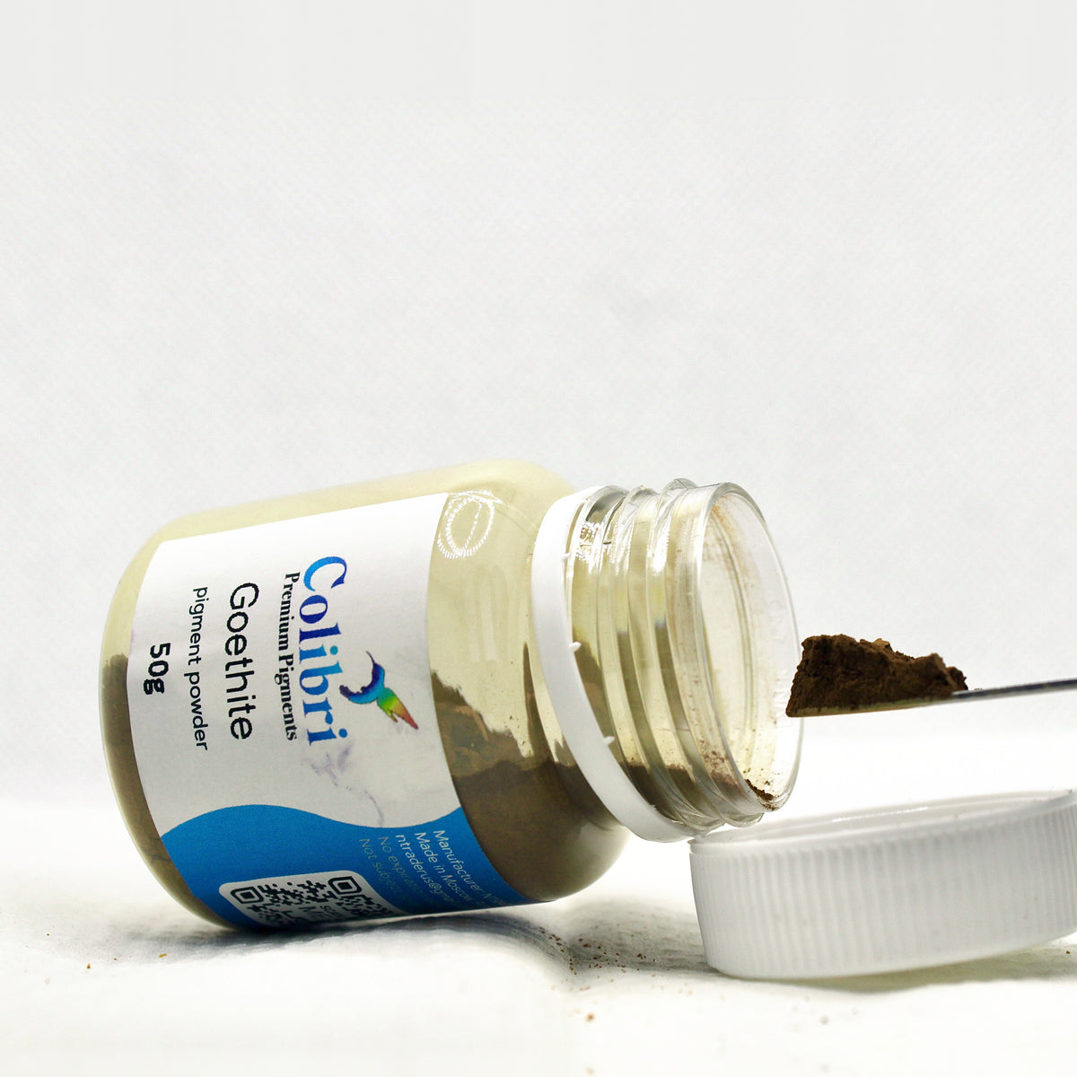 Goethite pigment powder, open jar
