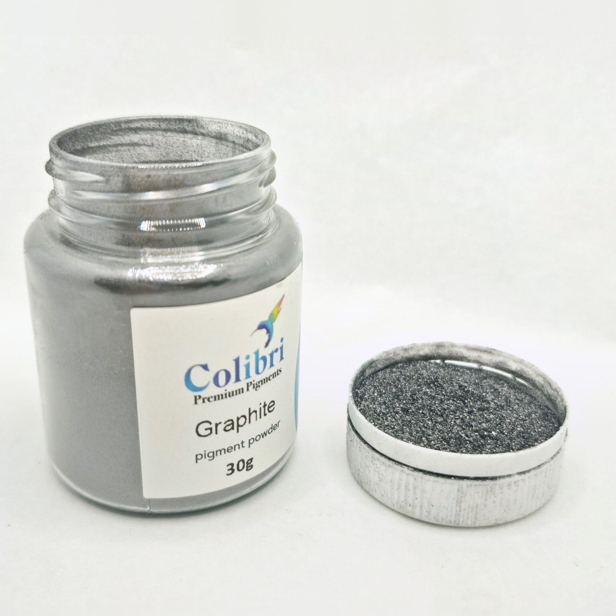 Graphite pigment powder, open jar