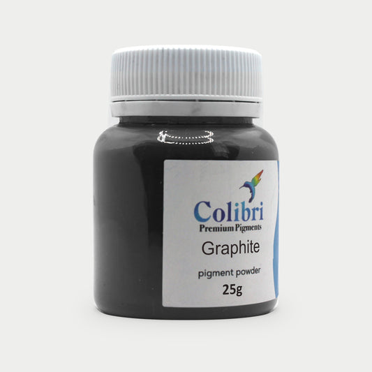 Graphite pigment powder in a Colibri jar