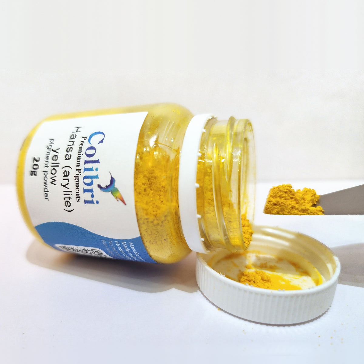 Hansa (Arylide) yellow pigment powder, open jar