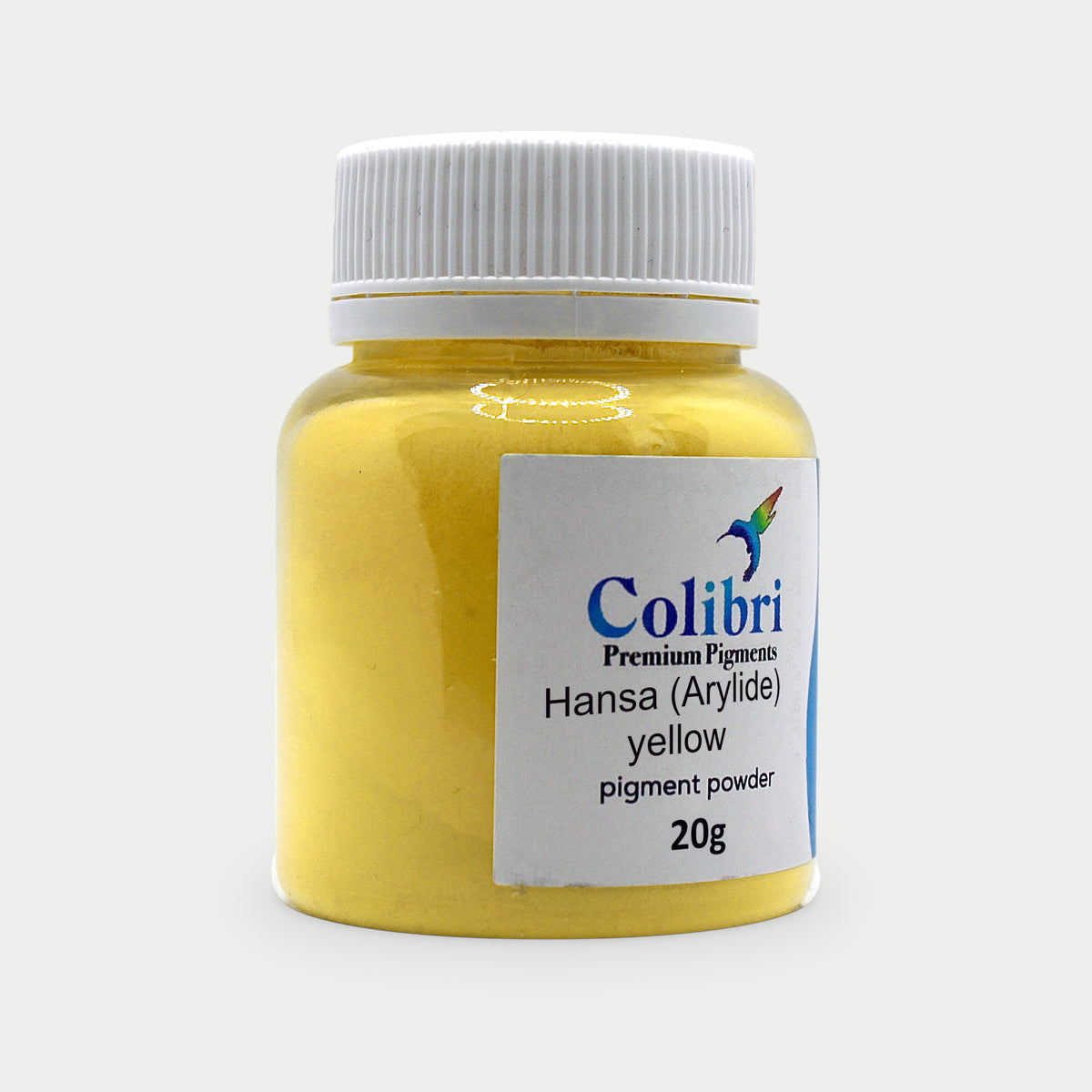 Hansa (Arylide) yellow pigment powder in a Colibri jar