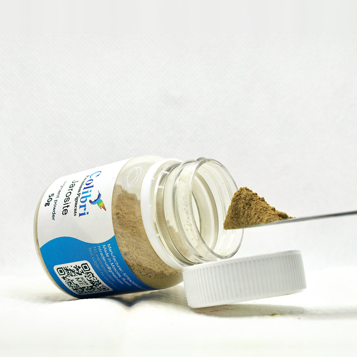 Jarosite pigment powder, open jar