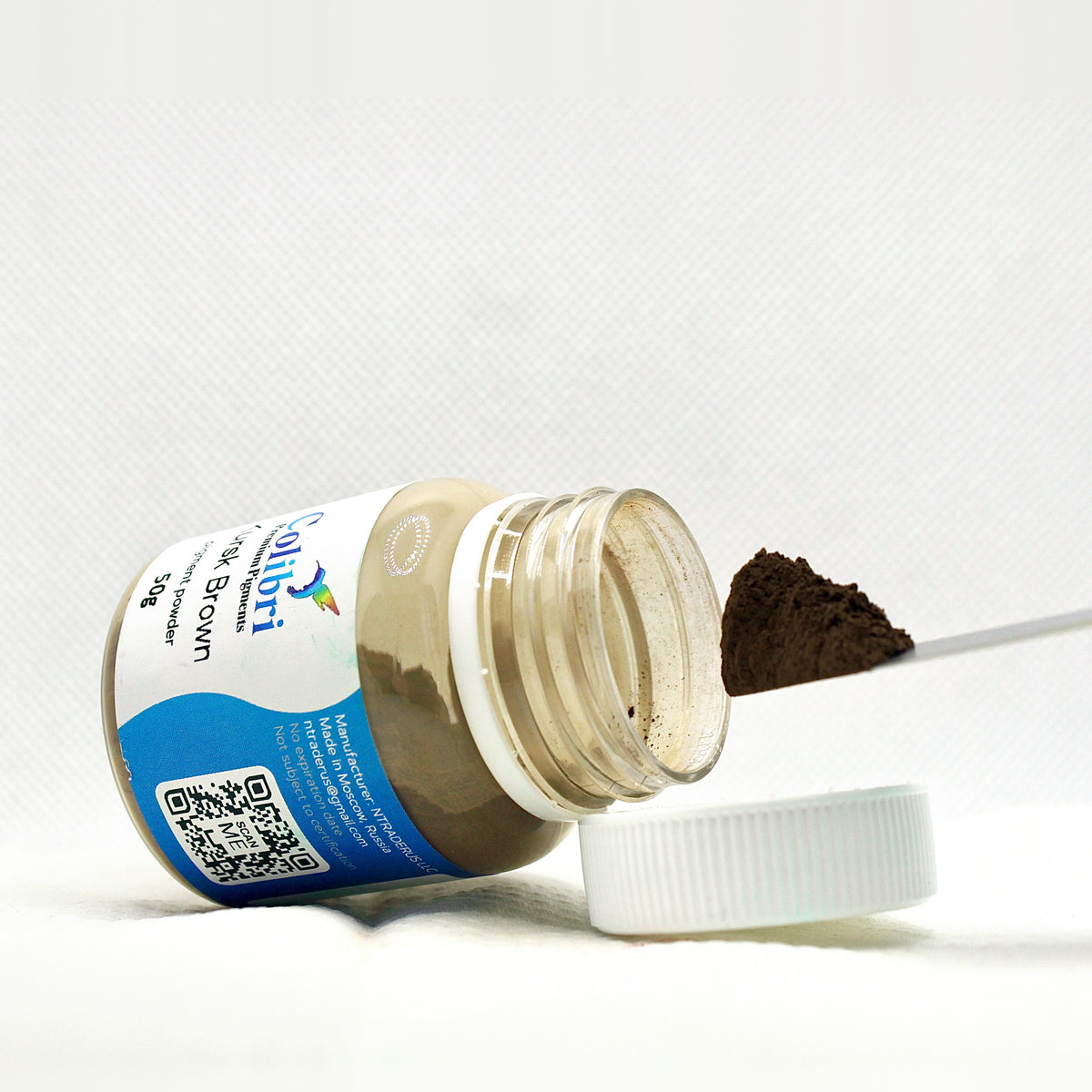 Kursk brown pigment powder, open jar