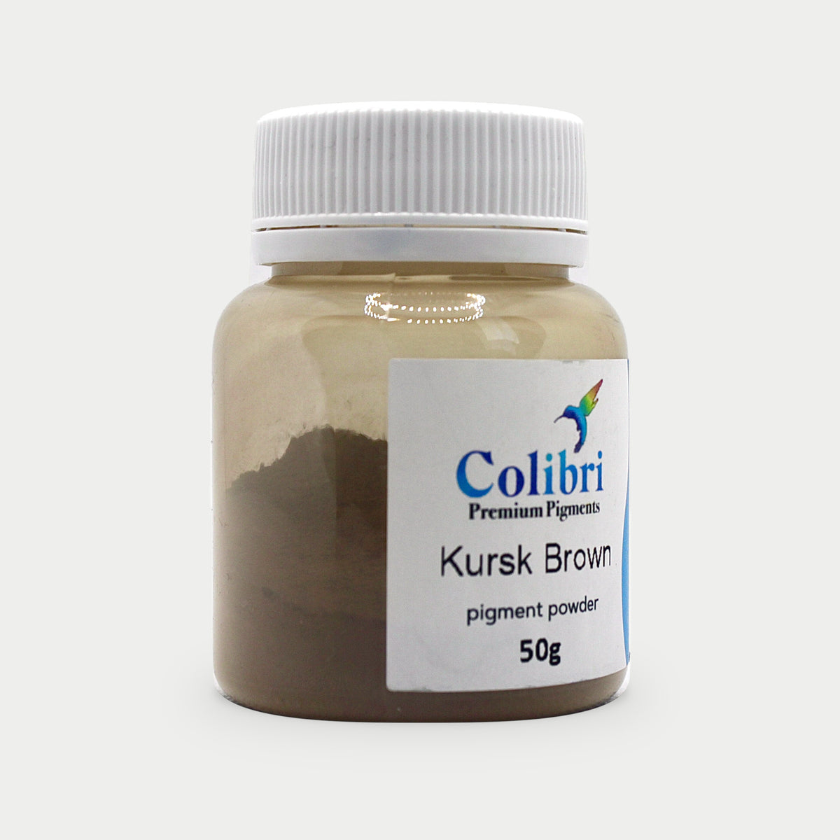 Kursk brown pigment powder in a Colibri jar