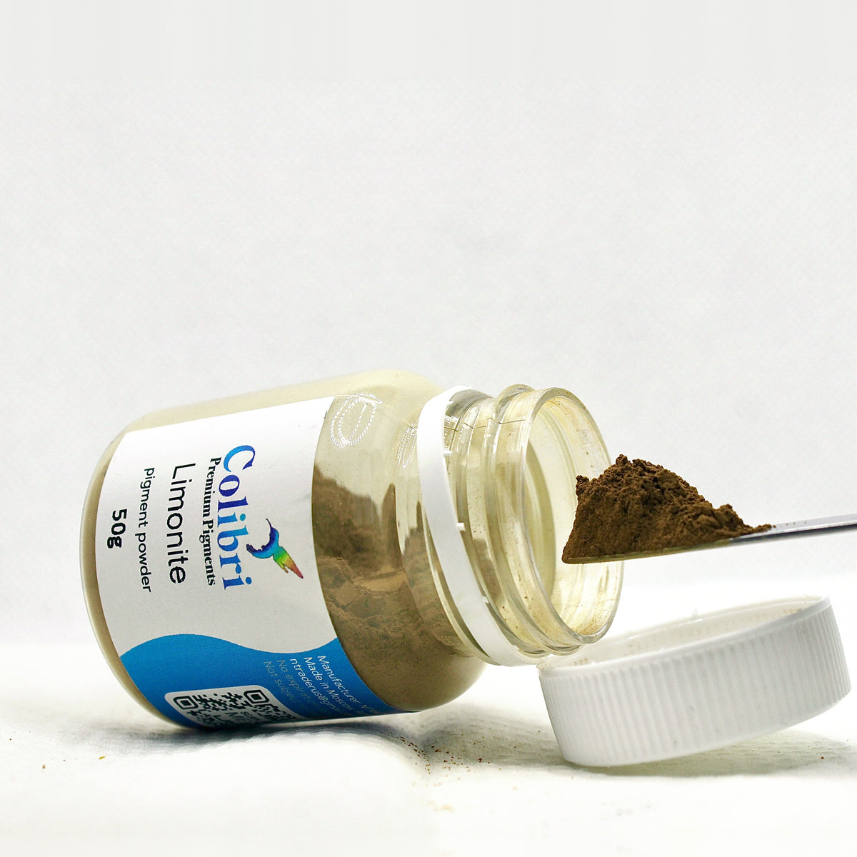Limonite pigment powder, open jar