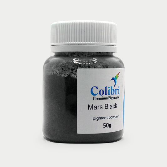 Mars black pigment powder in a Colibri jar