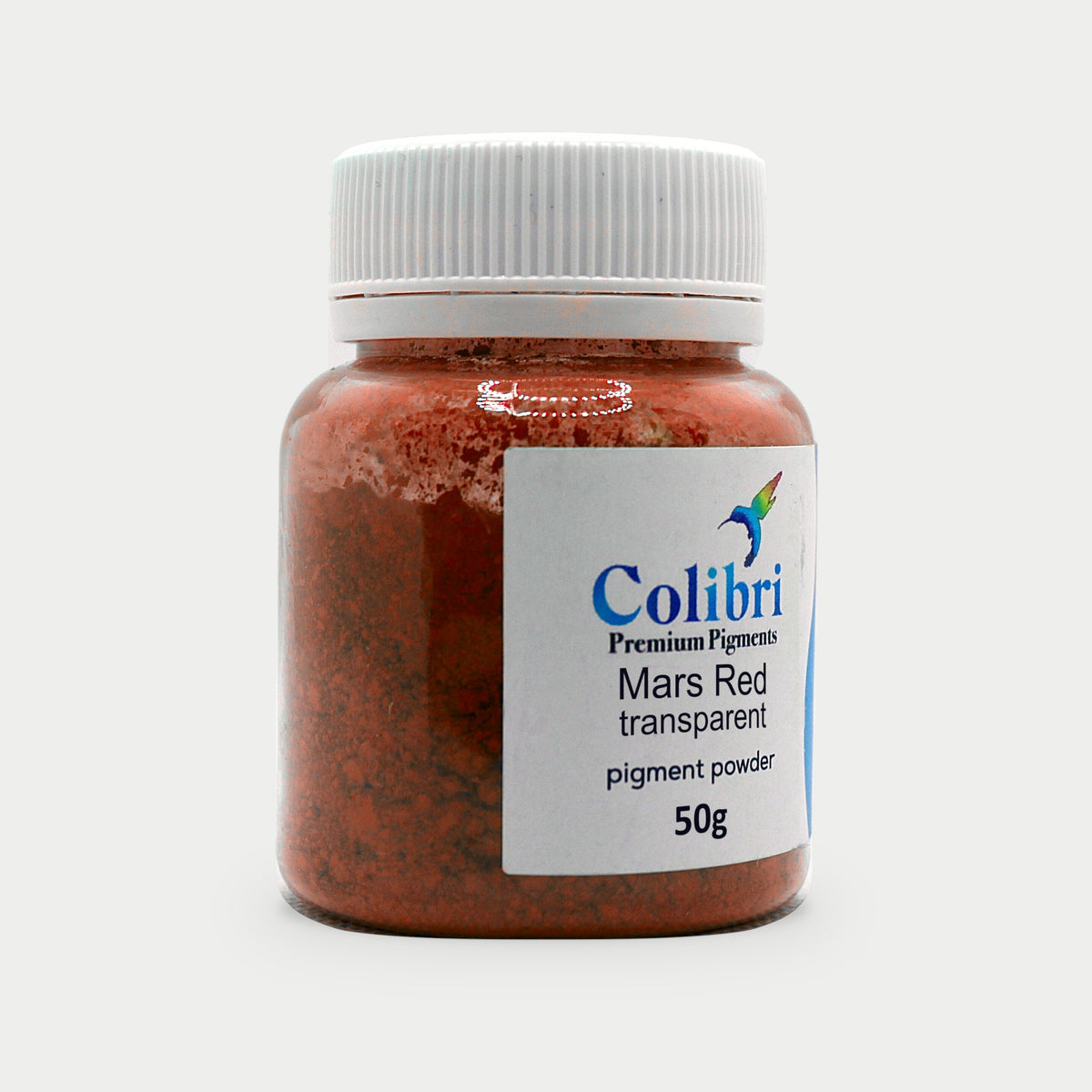 Mars red transparent pigment powder in a Colibri jar