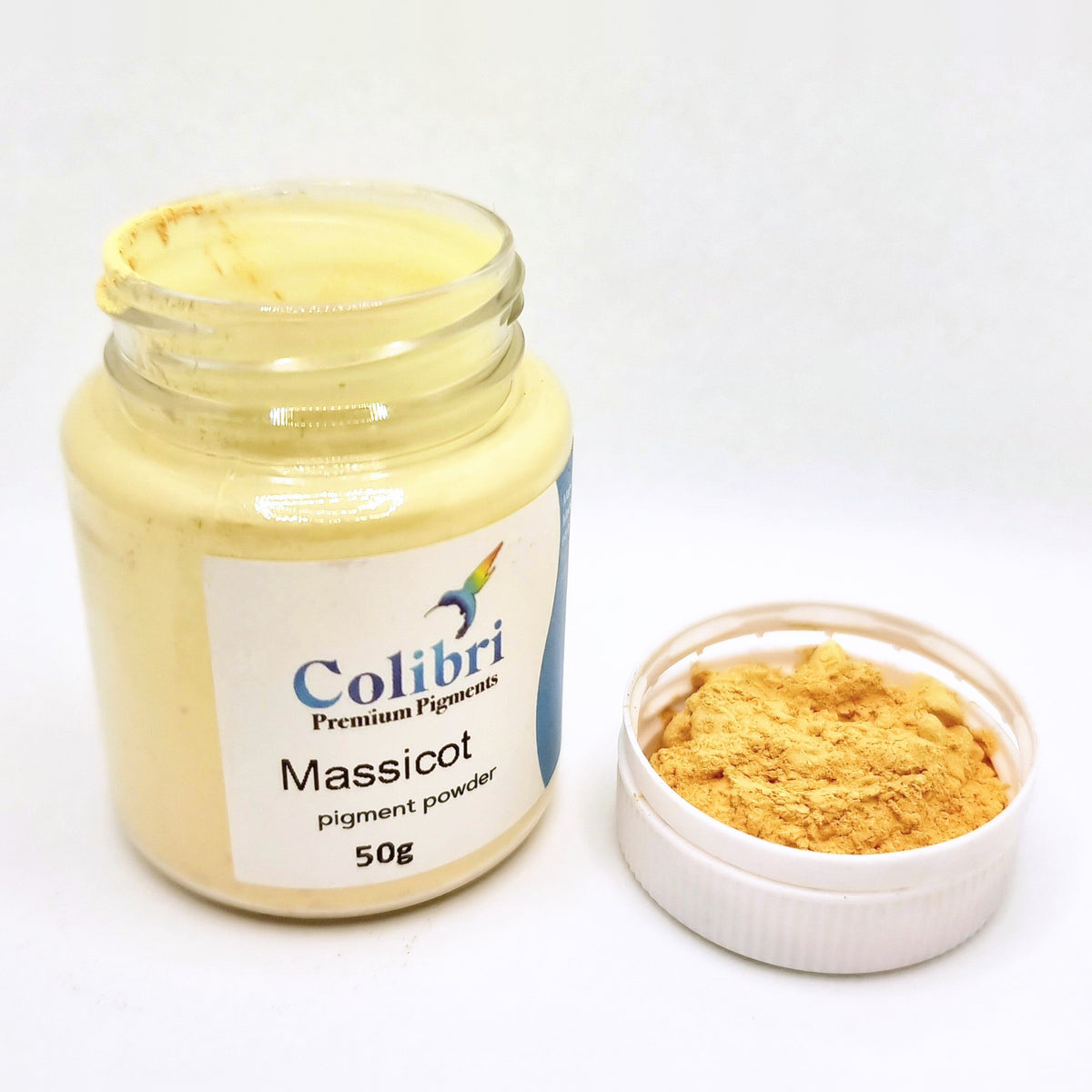 Massicot pigment powder, open jar