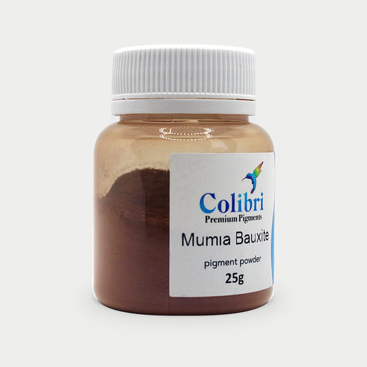 Mumia Bauxite pigment powder in a Colibri jar