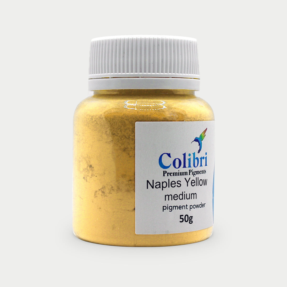Naples yellow medium pigment powder in a Colibri jar