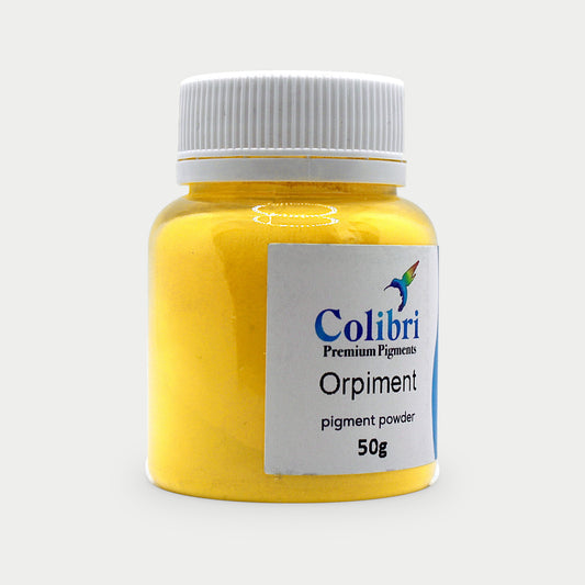 Orpiment pigment powder in a Colibri jar
