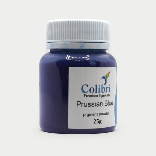 Prussian blue pigment powder in a Colibri jar