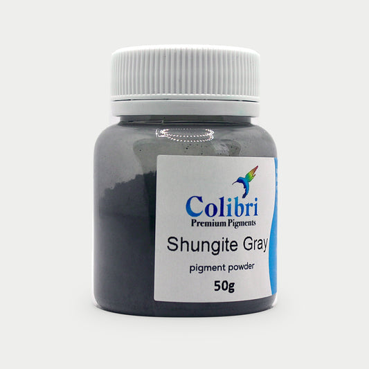 Shungite grey pigment powder in a Colibri jar