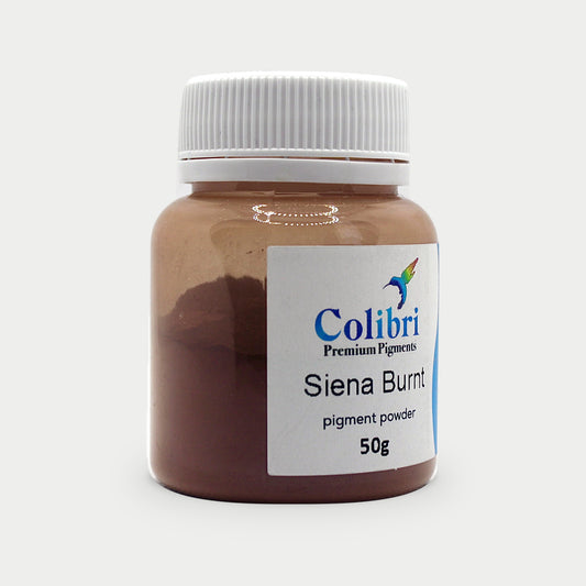 Siena burnt pigment powder in a Colibri jar