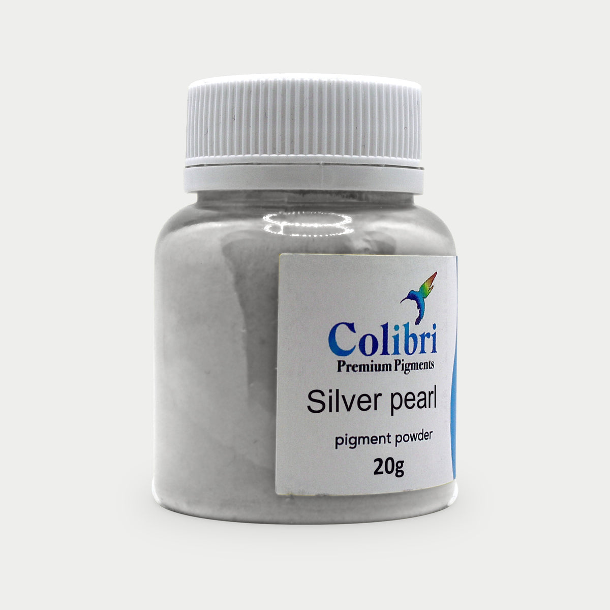 Silver pearl pigment powder in a Colibri jar