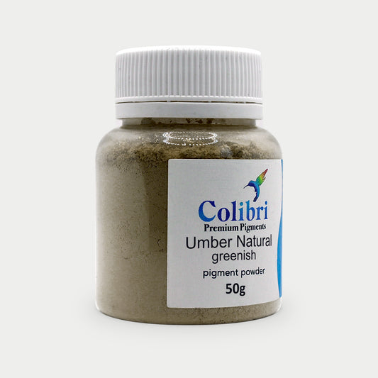 Umber natural greenish pigment powder in a Colibri jar