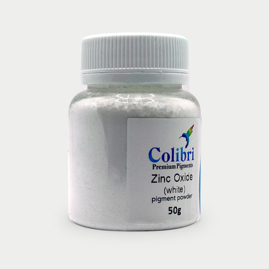 Zinc oxide (white) pigment powder in a Colibri jar
